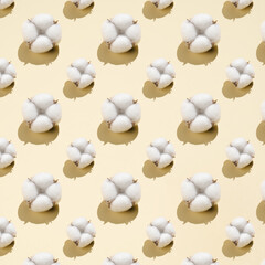 Cotton pattern on a light beige background.