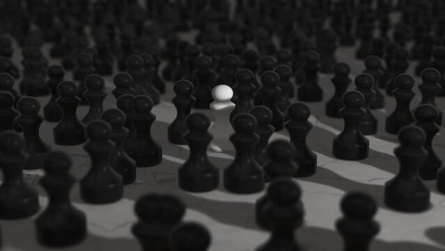 A single white pawn in a crowd of black pawns. Visualizes isolation, loneliness in an otherwise crowded surroundings.
Not fitting in, being a minority.
