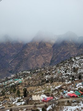 Joshimath, India - January 3rd 2022: Snow covered Joshimath as seen from Auli ropeway
