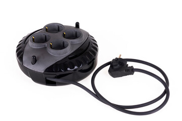 Extension cord and socket with special surge protection, standing on a white background. in black.