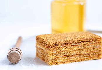 Fototapeta na wymiar Honey layered cake or russian cake Medovik on white background. Close up view