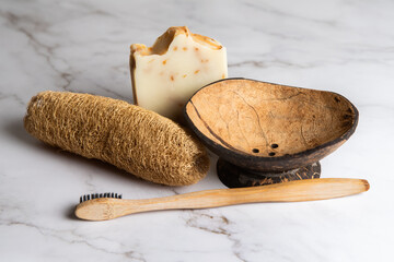 Coconut made soap dish wish hand made soap and loofah and wooden toothbrush