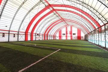 Wide angle image of the Astroturf facility. astroturf sports field empty state. soccer field...