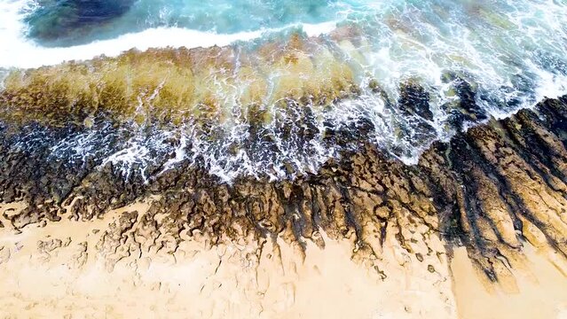 The waves making labyrinths on the shore