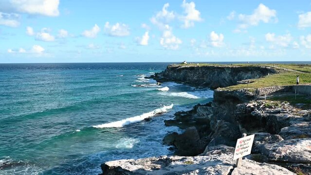 Waves crashing at the temple Ixchel on the island of Isla Mujeres in Punta Sur Mexico