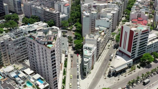 Aerial view cityscape of Rio de Janeiro. High-rise buildings in downtown city, streets with transport view parallel to the ground.