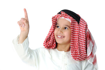 Cute Arabic little boy pushing digital button