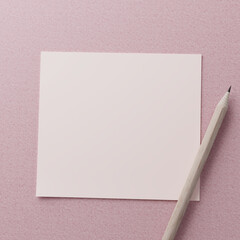white paper note with pencil