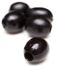 Black olives isolated on a white background.