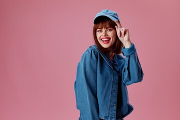 Positive young woman denim clothing fashion posing cap color background unaltered