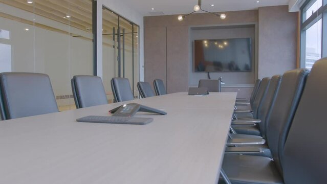 Mid View Tracking Shot Of A Newly Built Empty Meeting Room In A Corporate Office