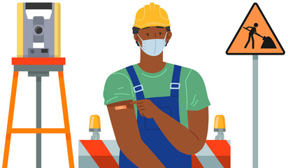Male builder wearing protective medical mask showing his arm with bandage after receiving covid-19 vaccine. Concept of vaccination, health, immunization, healthcare, call of fight against coronavirus