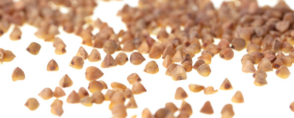 Buckwheat groats isolated on white background.