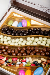 chocolate and colorful candies in a box