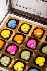 chocolate and colorful candies in a box