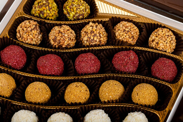 chocolate and colorful candies in a box