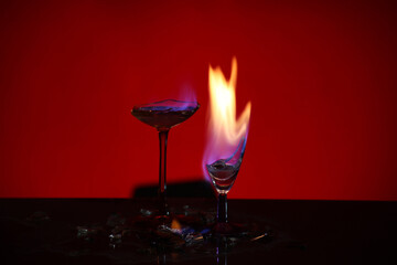 Burning goblet and dark background