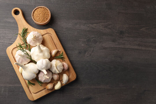 Concept of cooking with garlic on wooden table