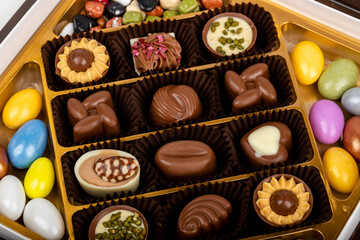 chocolate and colorful candies in a box