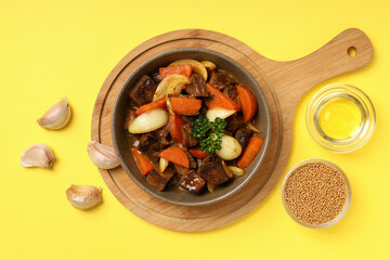 Concept of tasty food with beef with vegetables, top view