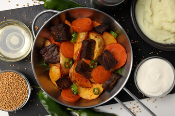 Concept of tasty food with beef with vegetables, top view