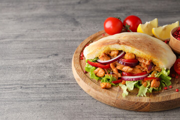 Concept of tasty food with pita with chicken, space for text