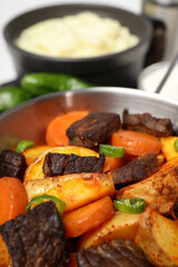 Concept of tasty food with beef with vegetables, close up
