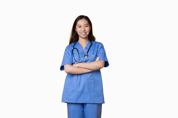 Doctor in a uniform standing with her arms crossed and smiling at the camera