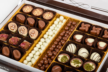 chocolate and colorful candies in a box