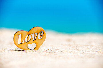 romantic symbol of heart on the beach

