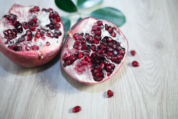 Close-up of pomegranates. Juicy ripe red pomegranates, organic vitamins. Organic and healthy pomegranate fruit .