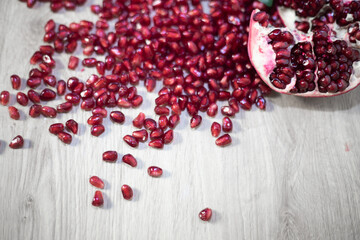 Close-up of pomegranates. Juicy ripe red pomegranates, organic vitamins. Organic and healthy pomegranate fruit .