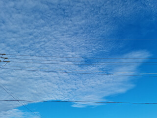 Obraz premium electric line with blue sky background