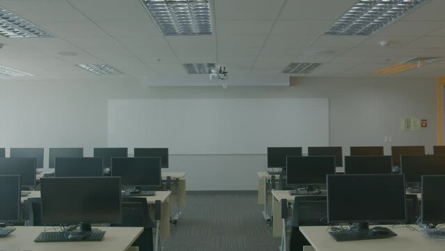 Tilt-Down Shot Of A Newly Built Training Room Of A Modern Call Center Office