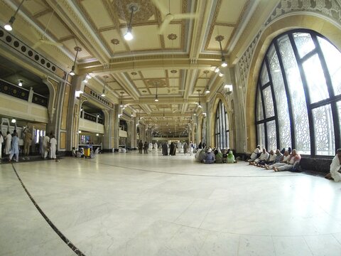 Muslim people praying at Kaaba in Mecca