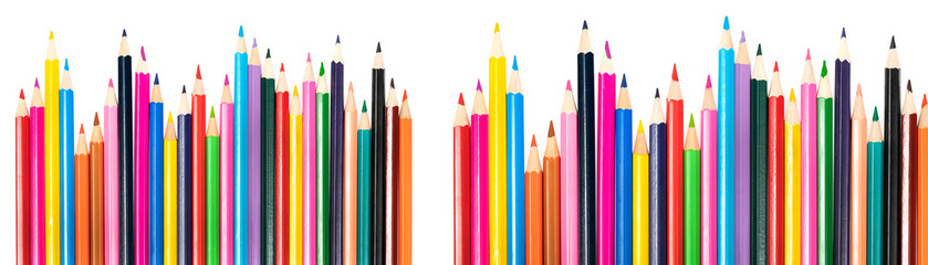 Wooden colored pencils isolated on a white background. A line of multicolored pencils in a large...
