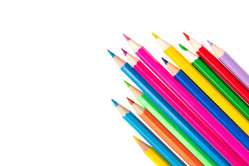 Wooden colored pencils isolated on a white background. A line of multicolored pencils in a large plan