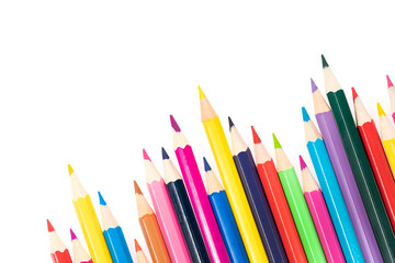 Fototapeta premium Wooden colored pencils isolated on a white background. A line of multicolored pencils in a large plan