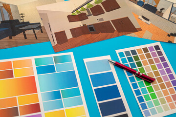 beautiful color palette with cool sketches spread out on a spacious table.