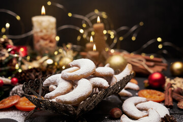 Traditional German or Austrian Vanillekipferl vanilla kipferl cookies on wooden table