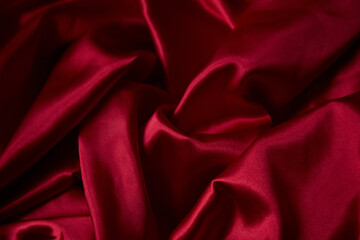 Beautiful draped silk fabric in red.