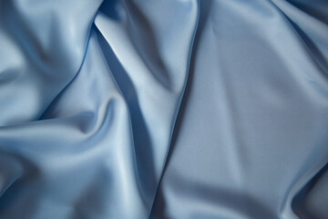 Beautiful draped silk fabric in blue.