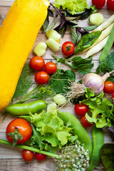 Autumn fresh vegetables on wooden table background