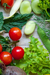 Autumn fresh vegetables on wooden table background