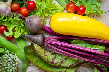 Autumn fresh vegetables on wooden table background