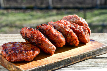 Home made Grilled pork meatballs  outdoor on wooden rustic background