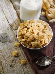 Quick breakfast. Cereal crunchy snacks and milk. Healthy food, healthy lifestyle, energy. children's, school, dietary, sports nutrition. There is no one in the photo. There is an empty space to insert
