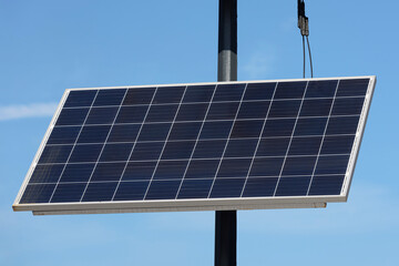 Solar panel board on the blue sky.