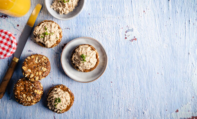 Homemade vegan tuna spread. Homemade vegan tuna spread served on whole grain bread, with a coffee...
