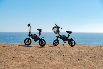 Two electric bikes against the view of the ocean at San Clemente, Orange County, California